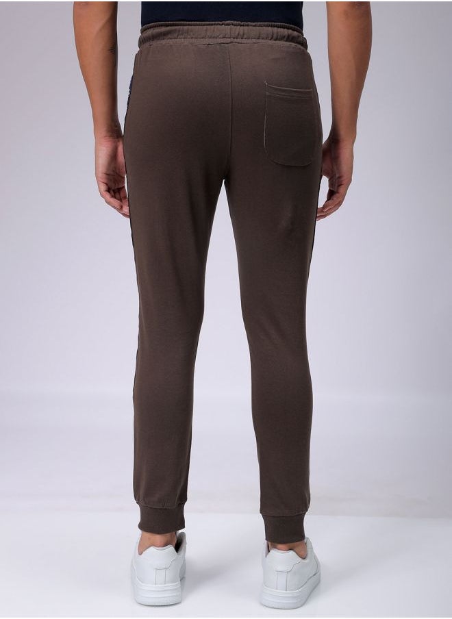Men Slim Fit Solid Mid-Rise Stretchable Knitted Jogger Trousers