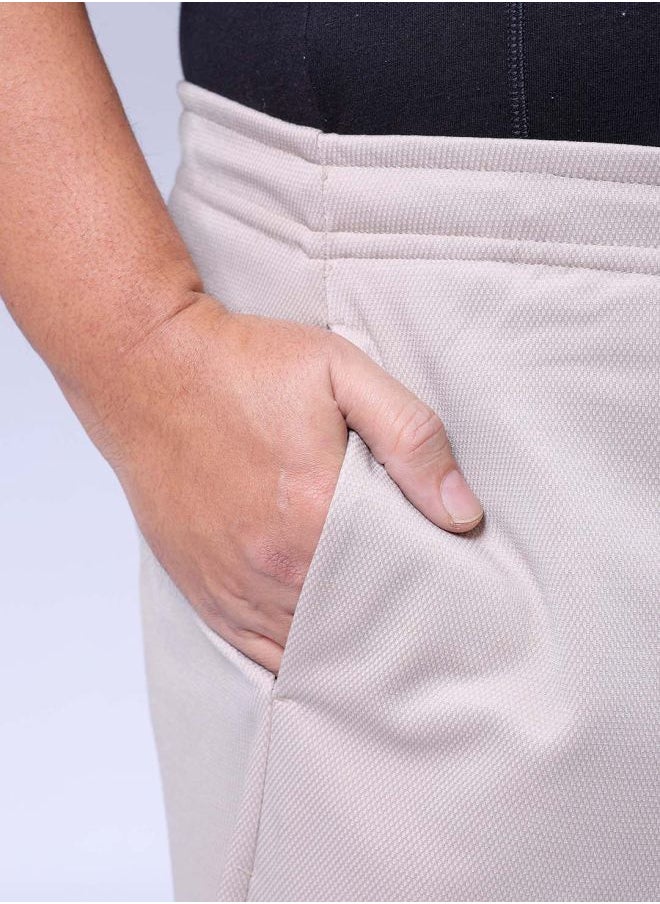 Men Plus Size Relaxed Fit Textured Mid-Rise Stretchable Joggers