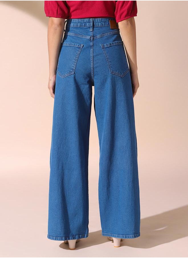 Women indigo relaxed fit solid 98% cotton 2% spandex jeans with button & zip closure- where comfort meets classic charm.