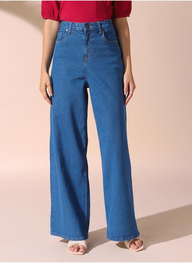 Women indigo relaxed fit solid 98% cotton 2% spandex jeans with button & zip closure- where comfort meets classic charm.