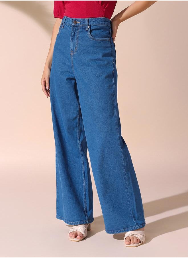 Women indigo relaxed fit solid 98% cotton 2% spandex jeans with button & zip closure- where comfort meets classic charm.