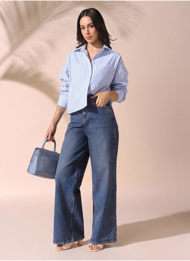 Women indigo relaxed fit solid 98% cotton 2% spandex jeans with button & zip closure- a fresh take on timeless style.