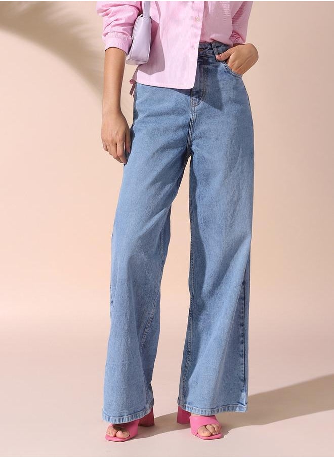 Women indigo relaxed fit solid 98% cotton 2% spandex jeans with button & zip closure- your next go-to for effortless flair.