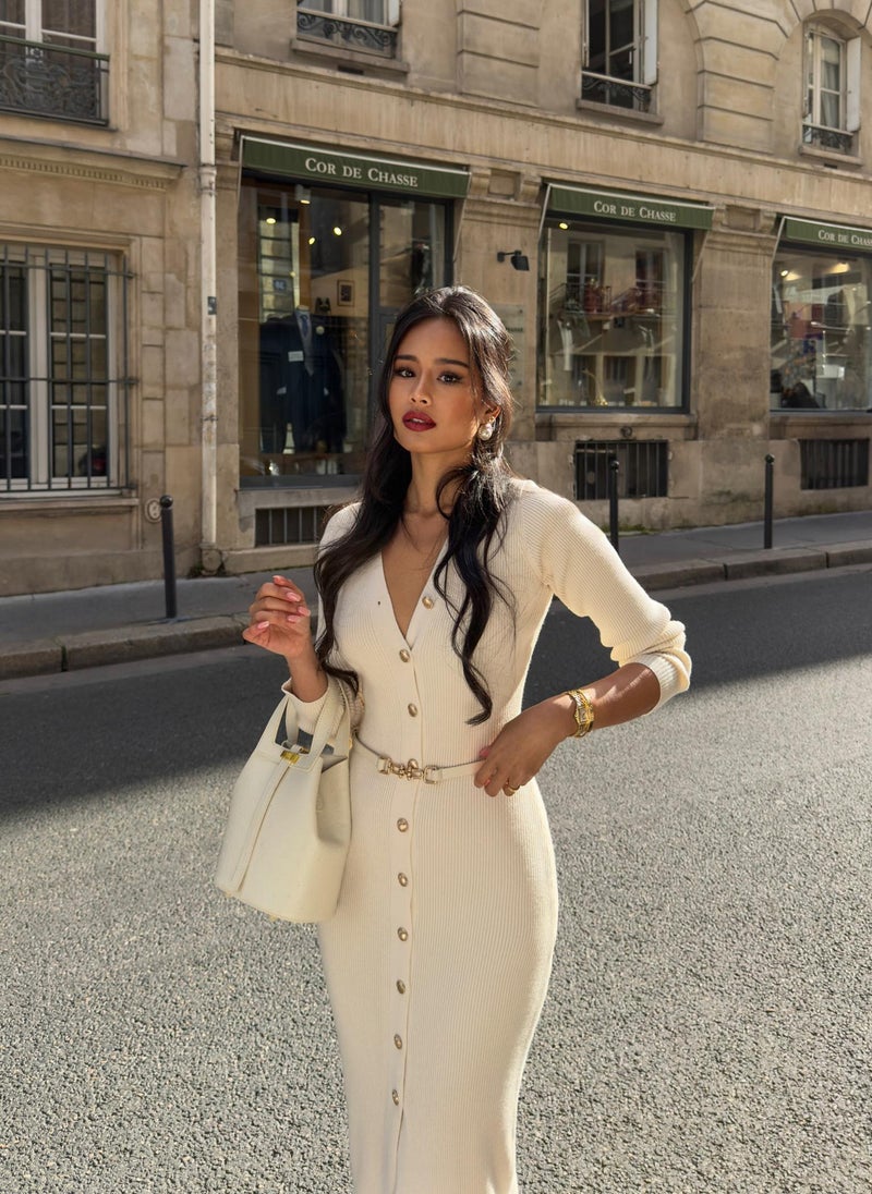 Knitted midi dress with a belt and golden decorations