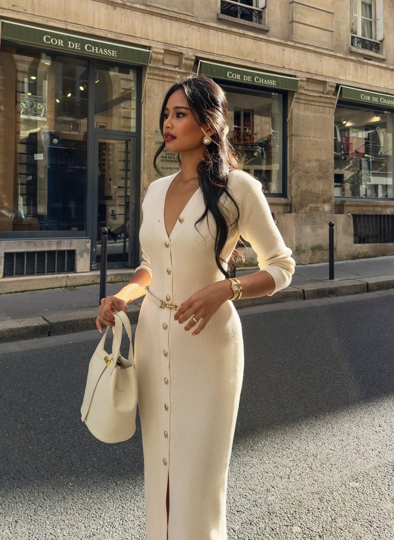 Knitted midi dress with a belt and golden decorations