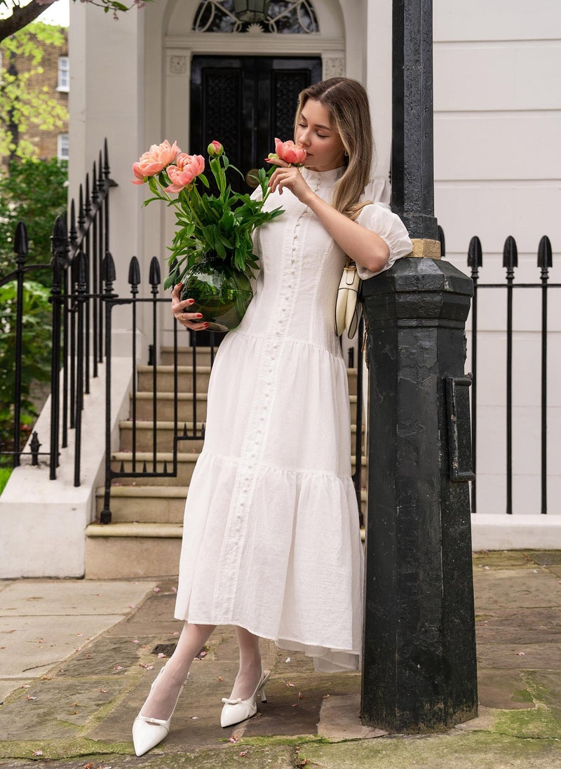 Lightweight midi dress in textured fabric with voluminous sleeves