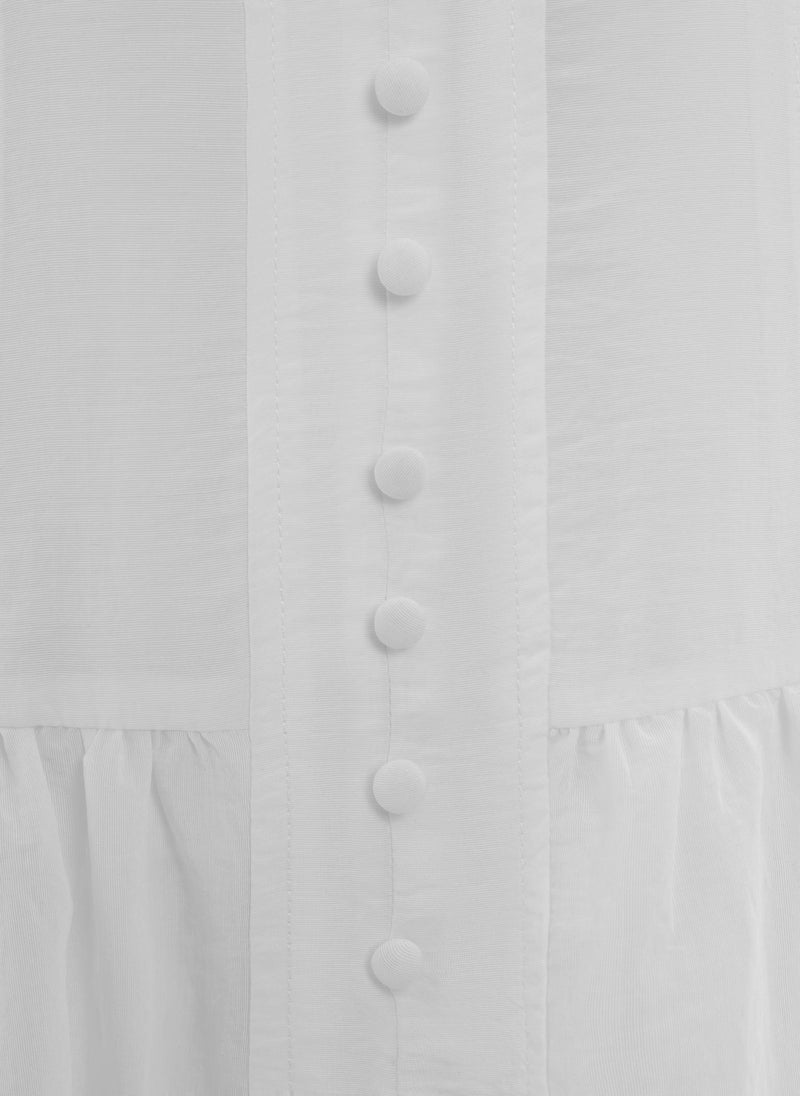 Lightweight midi dress in textured fabric with voluminous sleeves
