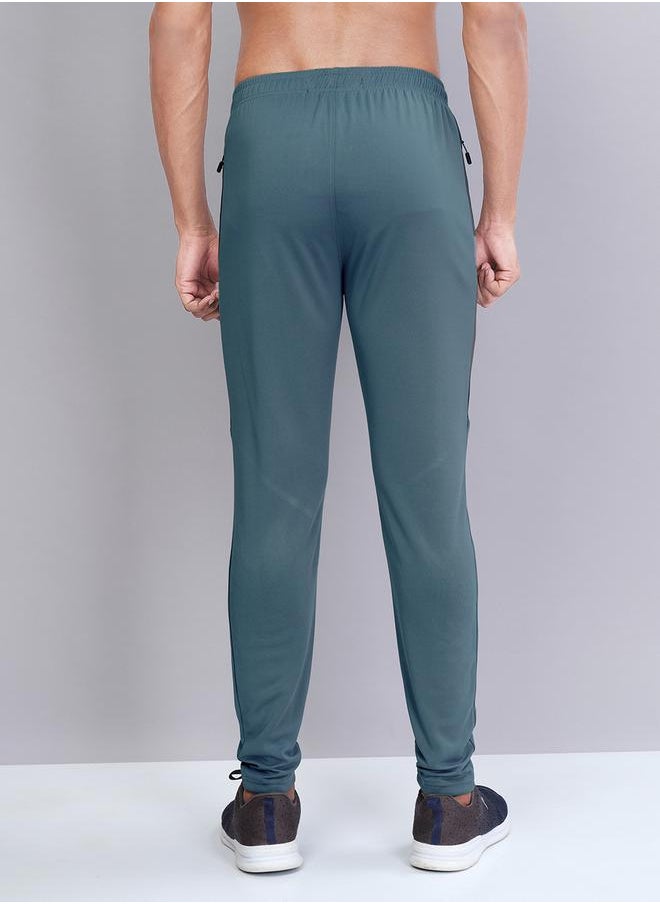 Men Solid Slim Fit Track Pants with TECHNO DRY