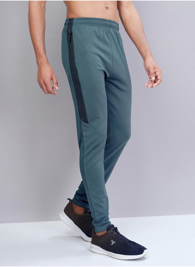 Men Solid Slim Fit Track Pants with TECHNO DRY