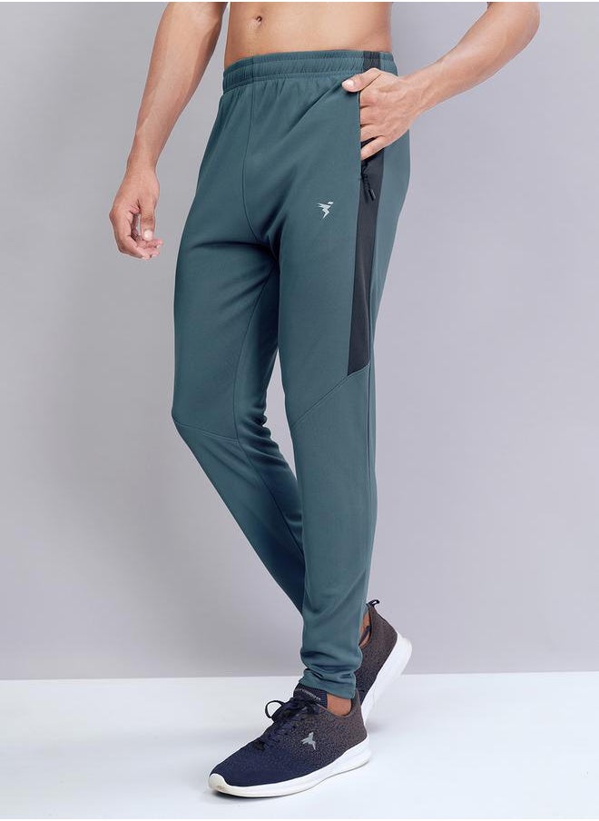 Men Solid Slim Fit Track Pants with TECHNO DRY