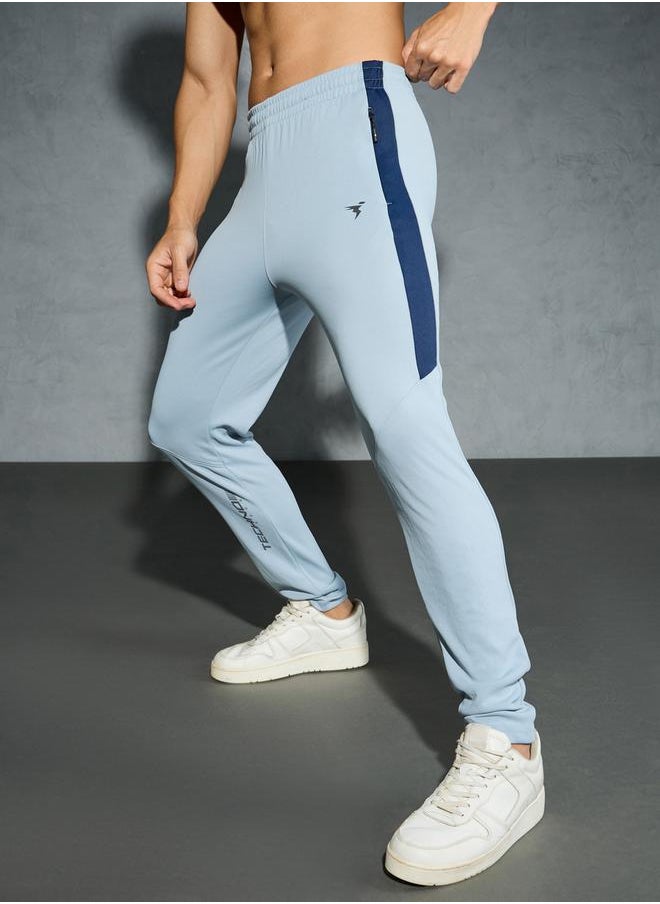Men Solid Slim Fit Track Pants with Techno Dry by Styli