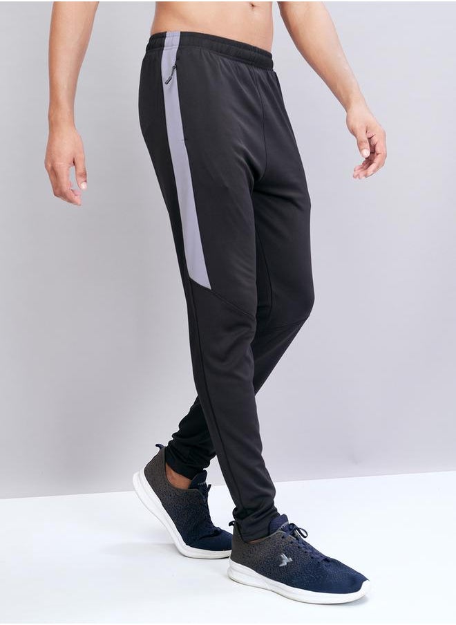 Men Solid Slim Fit Track Pants with TECHNO DRY