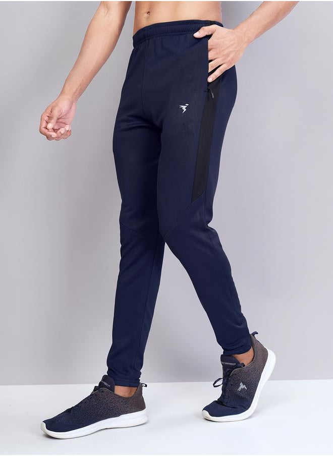 Men Solid Slim Fit Track Pants with TECHNO DRY by Styli