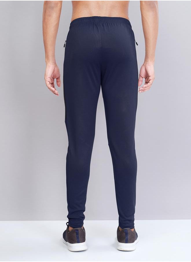 Men Solid Slim Fit Track Pants with TECHNO DRY by Styli