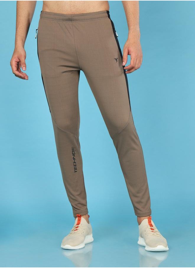 Men Solid Slim Fit Track Pants with TECHNO DRY