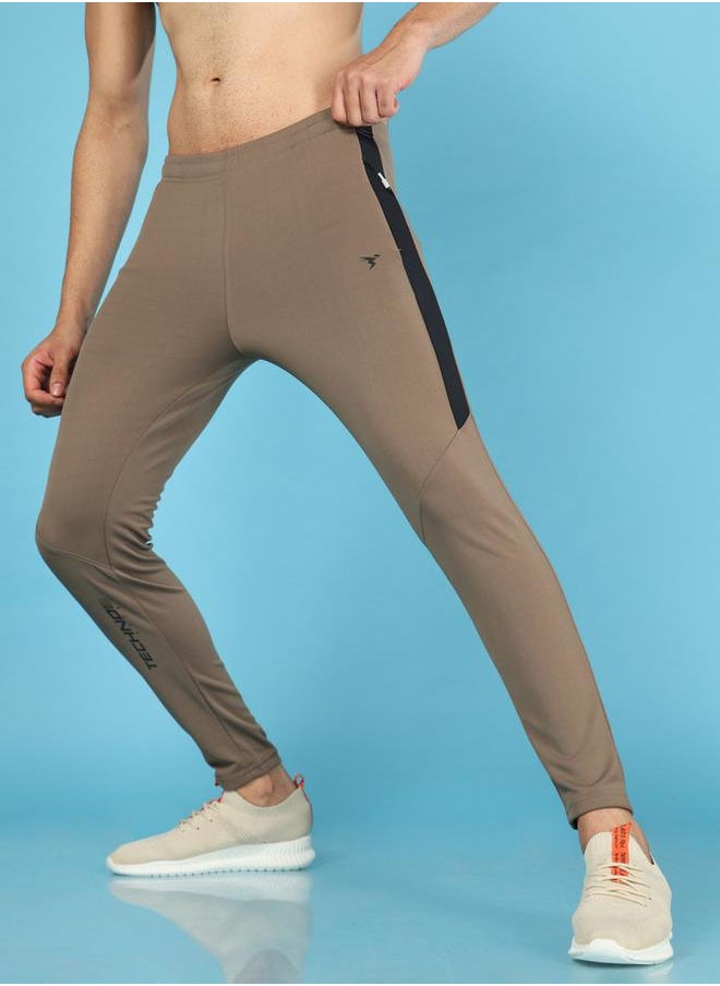 Men Solid Slim Fit Track Pants with TECHNO DRY