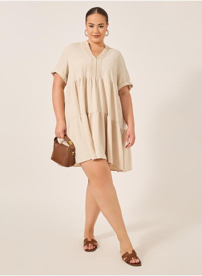 Beige A-Line Mini Dress with Lace Detail