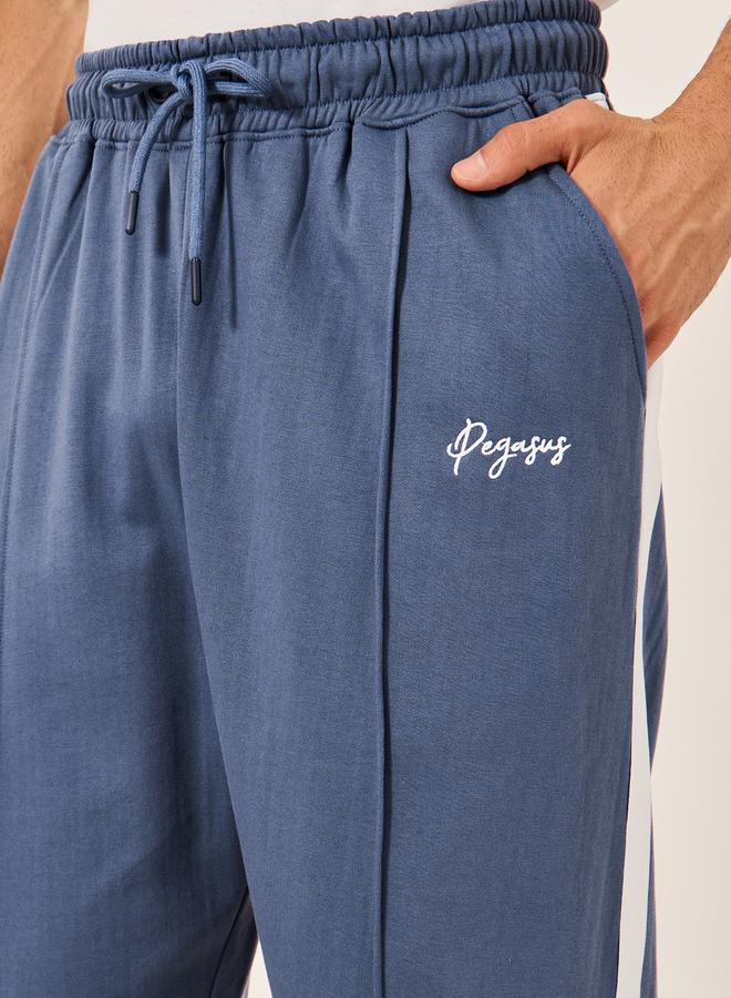 Oversized Wide Tuck Fleece Joggers with Side Stripe and Print Detail