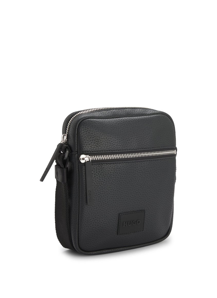 Grained faux-leather reporter bag with rubber logo patch