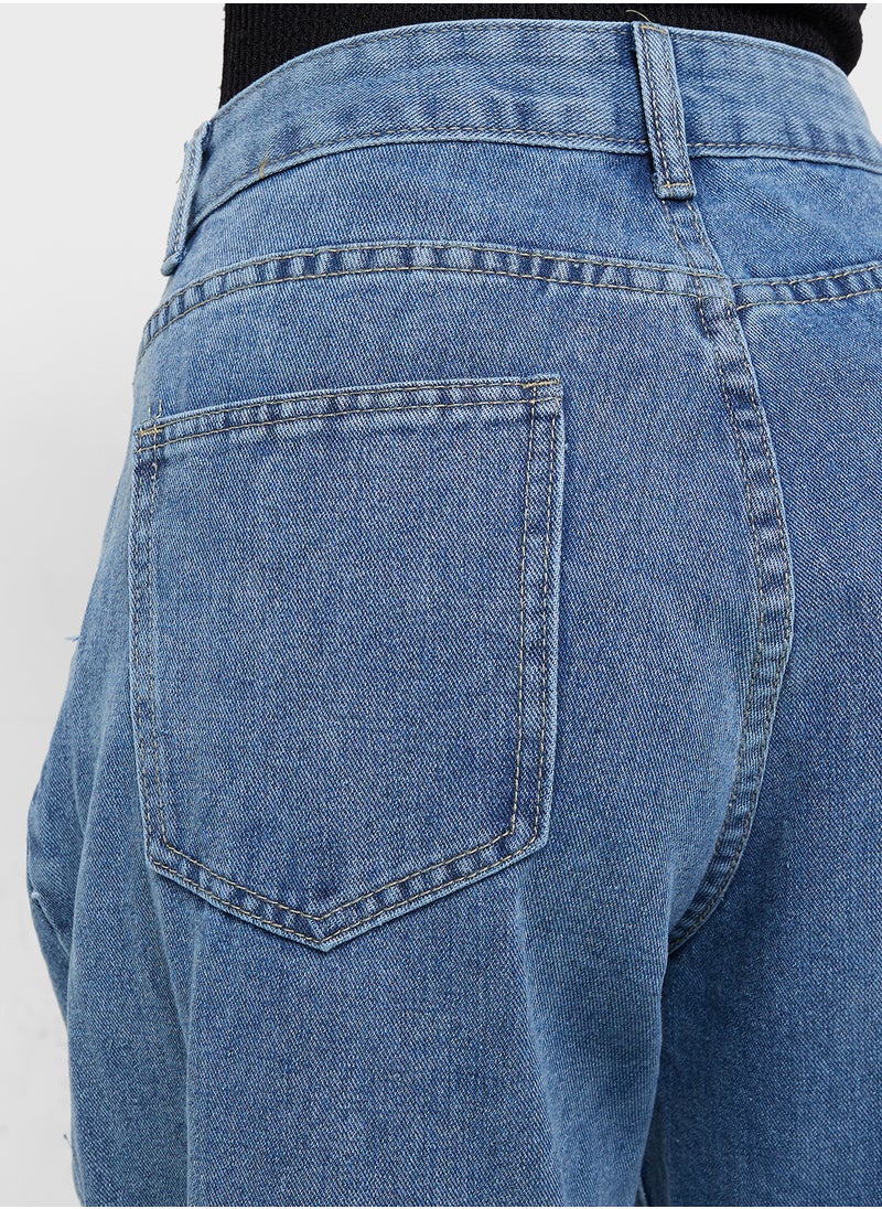 Mid Rise Flared Jeans With Pleat Detail
