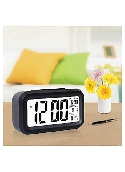 RIMCART Digital Smart Alarm Clock with Date Temperature Display Snooze Alarm Table Clock for Home Bedroom with Smart Automatic Sensor Backlight Battery Operated Clock