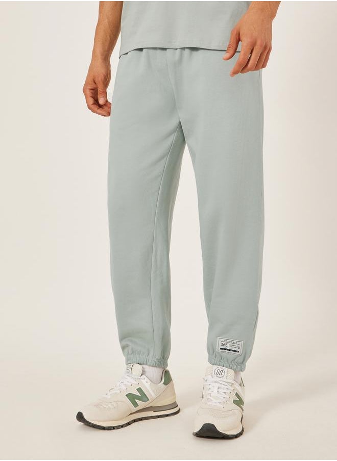 Mid Rise Relaxed Fit Joggers with Badge Detail