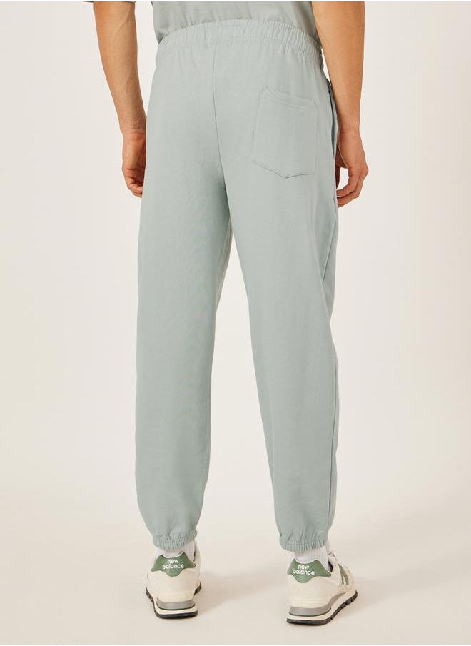 Mid Rise Relaxed Fit Joggers with Badge Detail