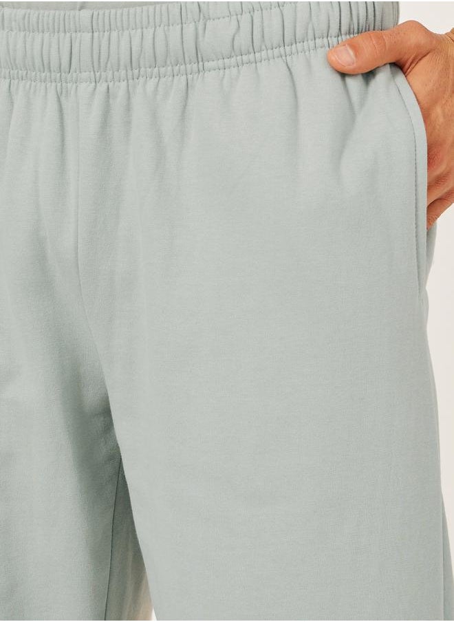 Mid Rise Relaxed Fit Joggers with Badge Detail