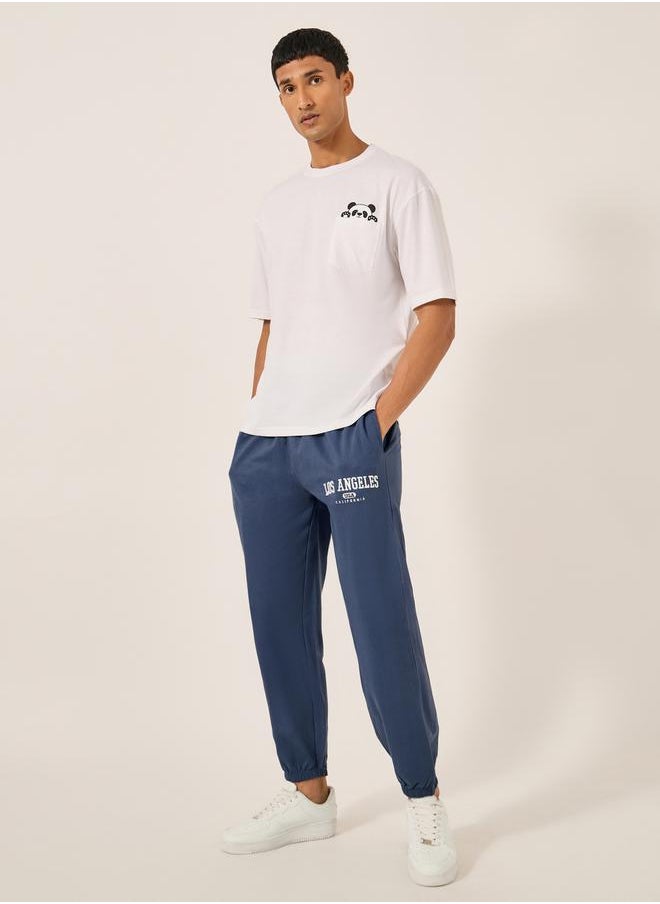 Embroidered Slogan Mid Rise Relaxed Fit Joggers