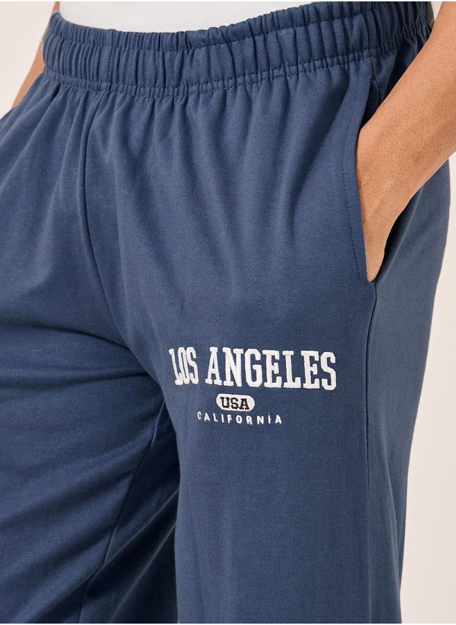 Embroidered Slogan Mid Rise Relaxed Fit Joggers