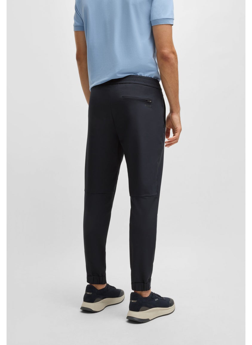 Tapered-fit trousers in water-repellent stretch fabric