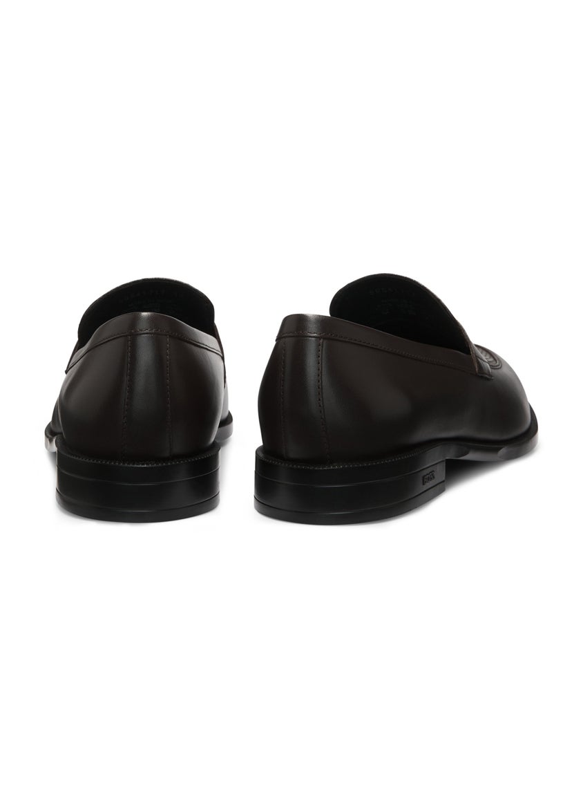 Penny loafers in printed and smooth leather