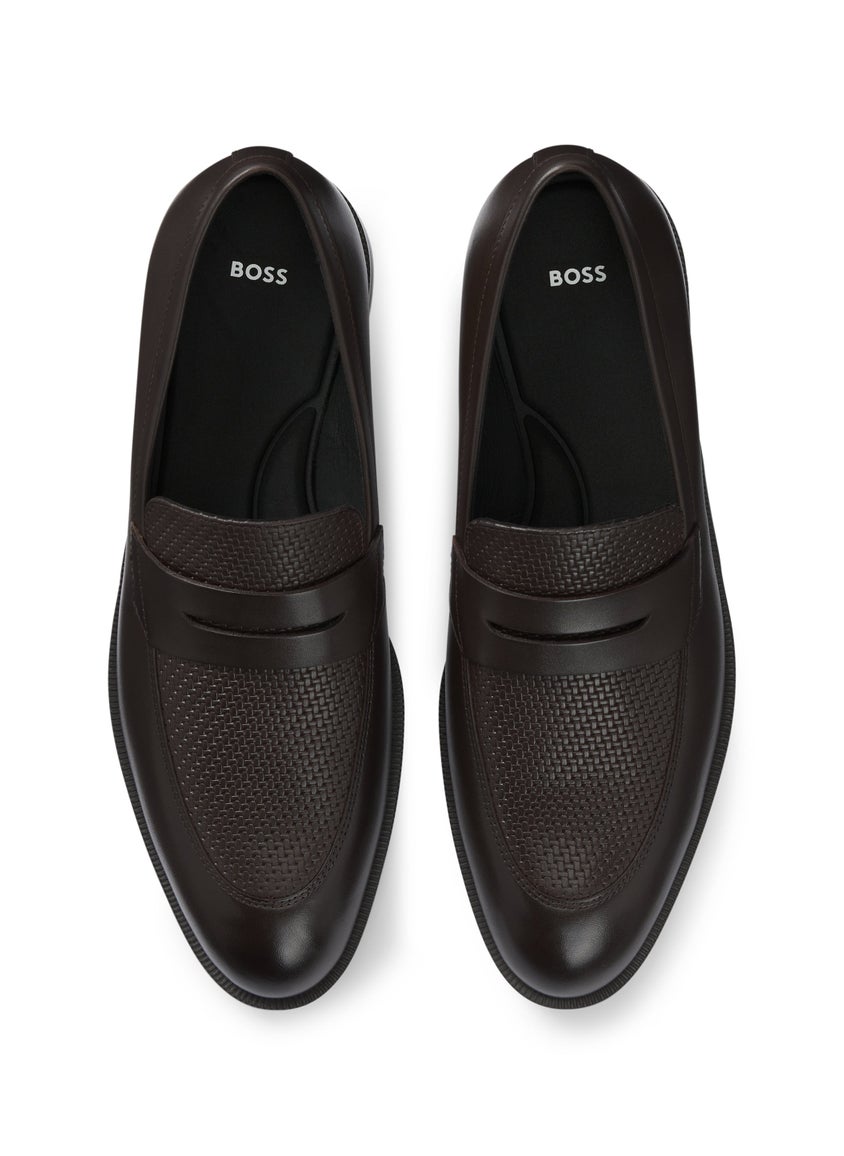 Penny loafers in printed and smooth leather