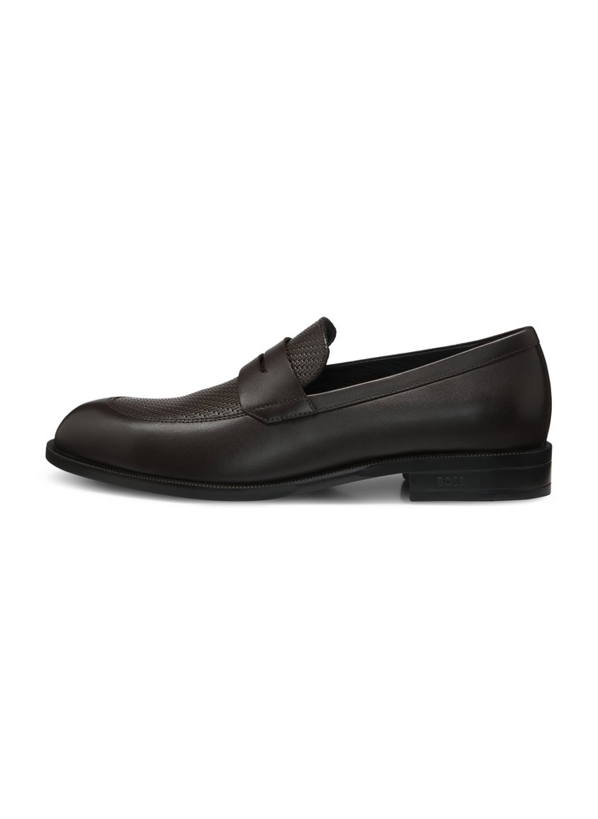Penny loafers in printed and smooth leather