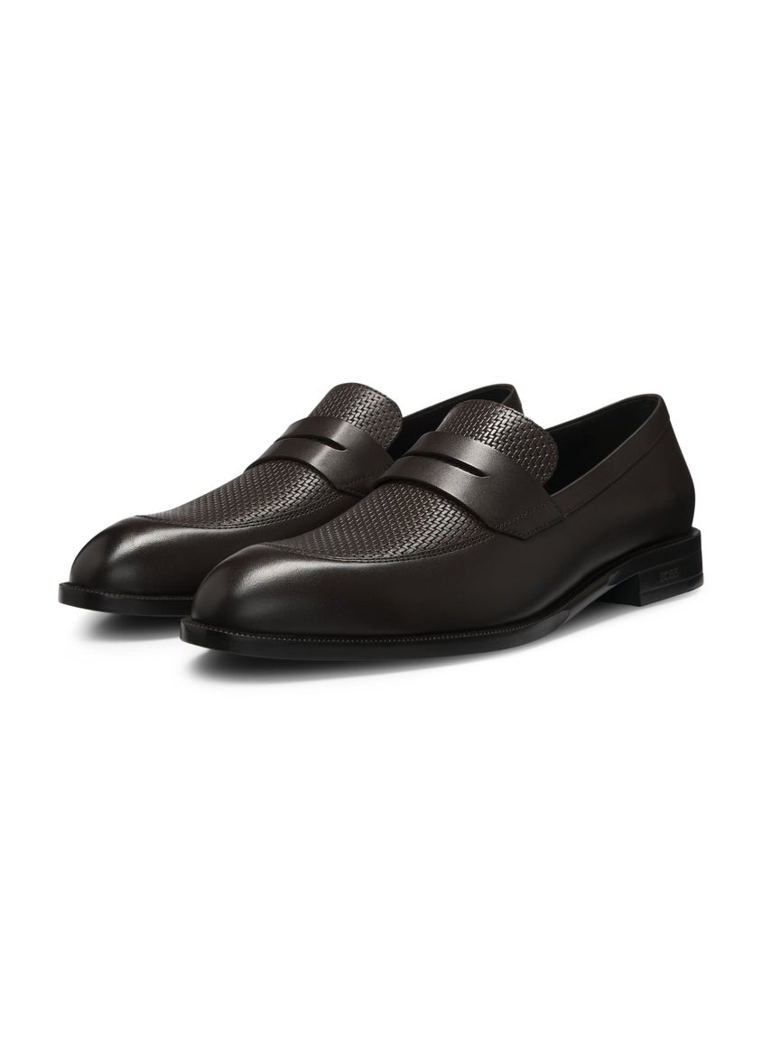 Penny loafers in printed and smooth leather