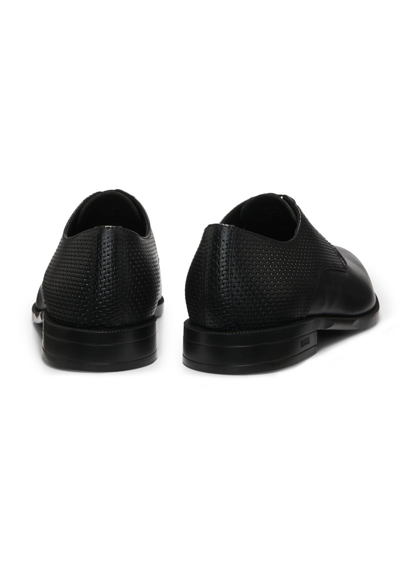 Derby shoes in printed and smooth leather