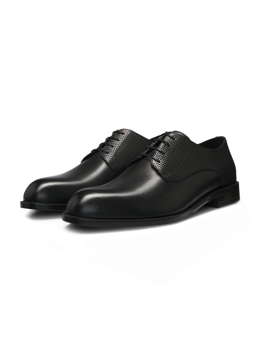 Derby shoes in printed and smooth leather