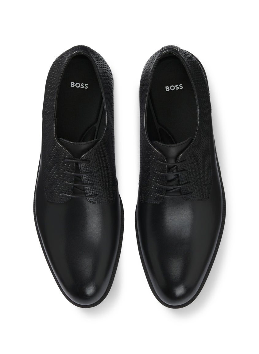 Derby shoes in printed and smooth leather