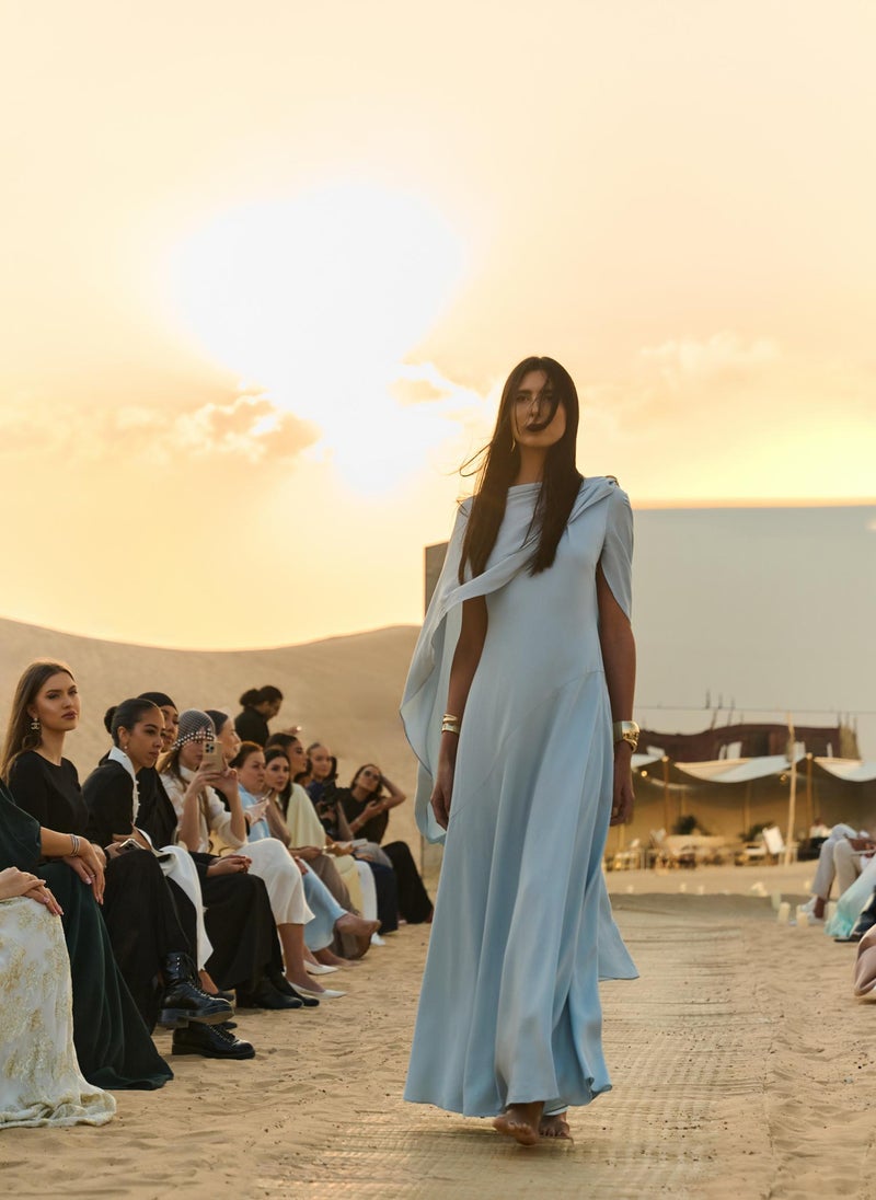 Maxi dress with asymmetrical cape