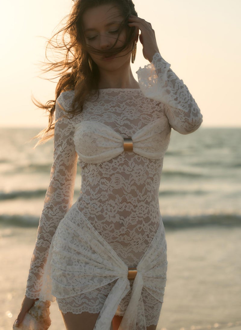 Guipure mini dress with draped neckline and golden decor