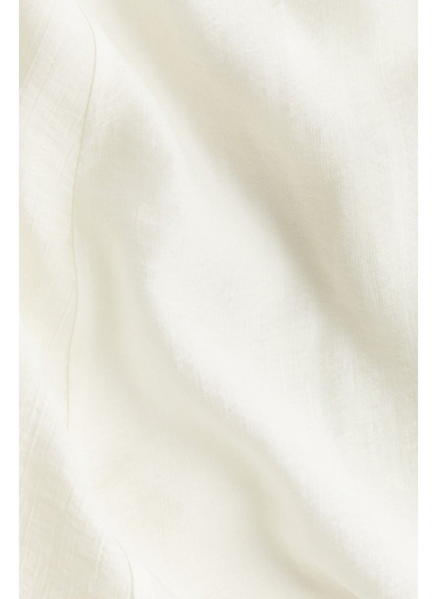 Asymmetric-Hem Dress
