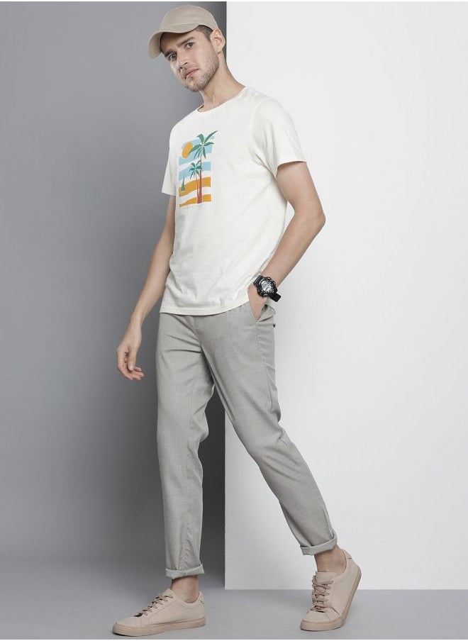 Men Regular Fit Self Design Mid-Rise Stretchable Jogger Trousers