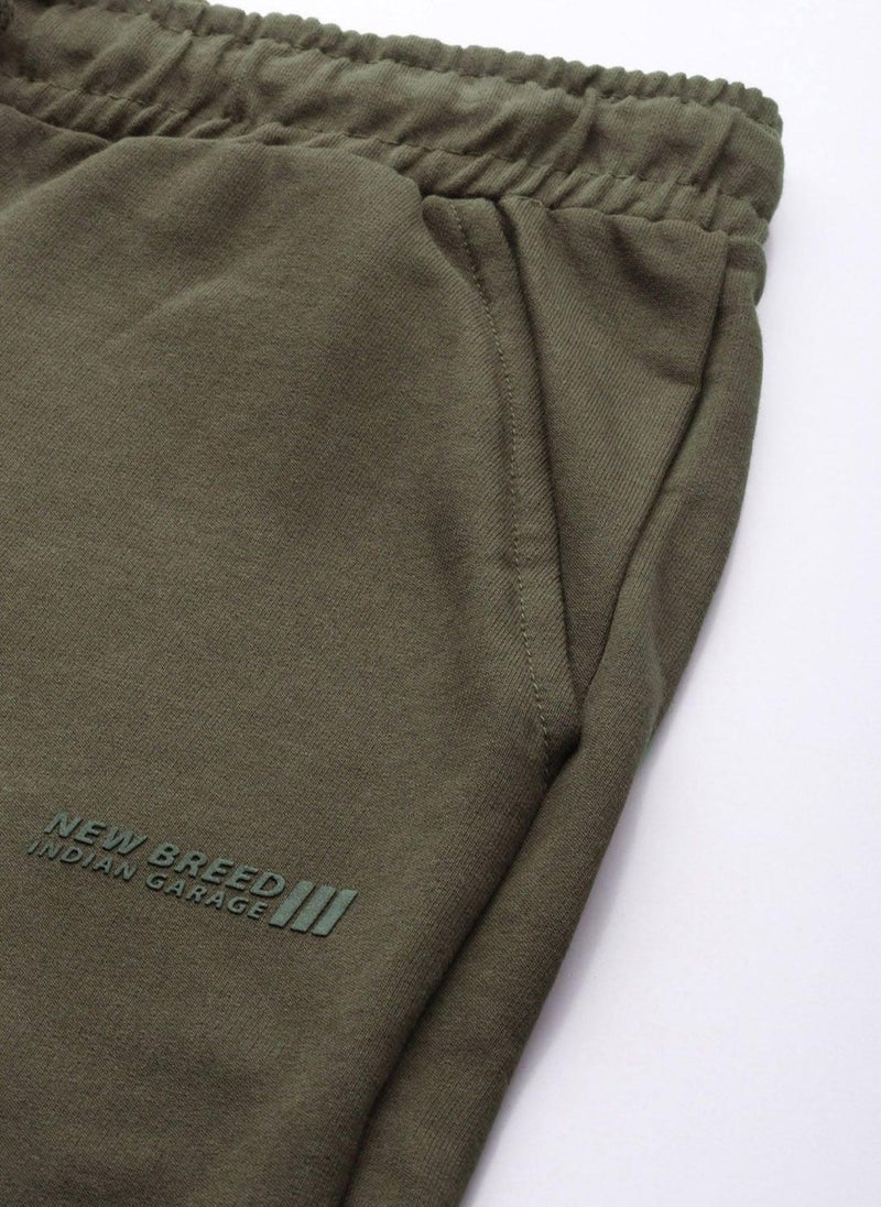 Men Slim Fit Solid Mid-Rise Stretchable Knitted Jogger Trousers