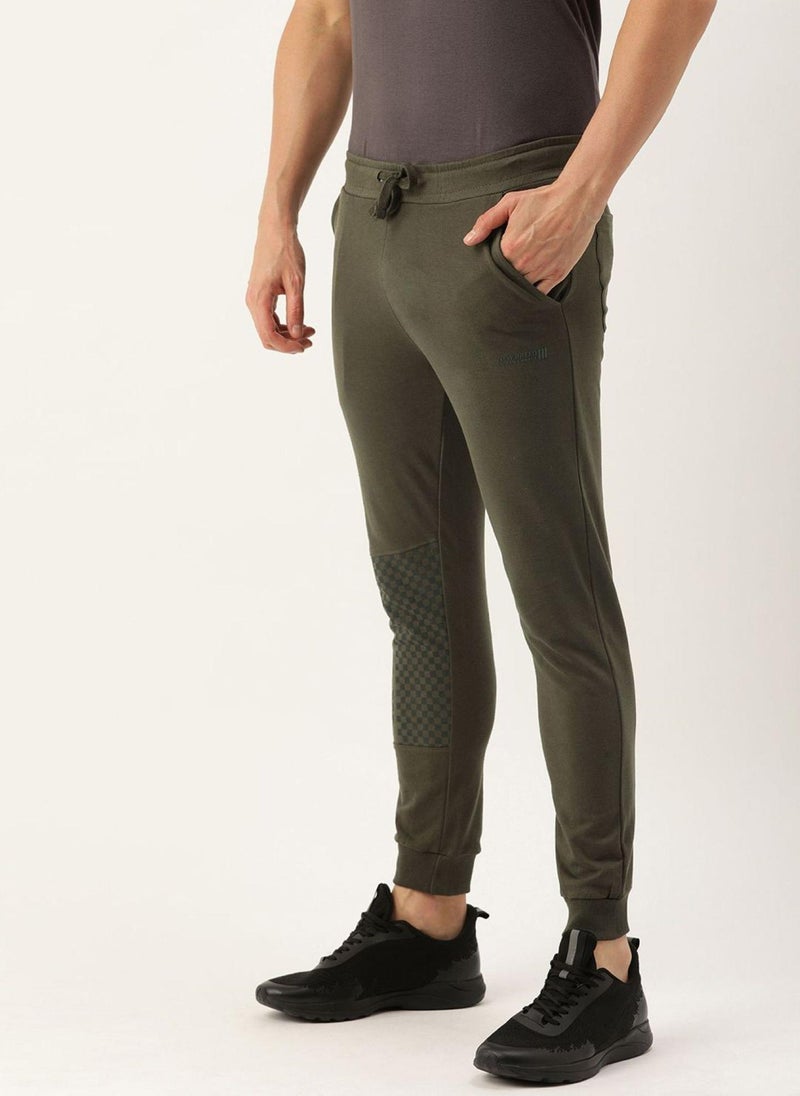 Men Slim Fit Solid Mid-Rise Stretchable Knitted Jogger Trousers