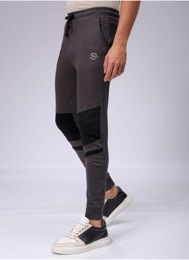 Men Slim Fit Solid Mid-Rise Stretchable Knitted Jogger Trousers