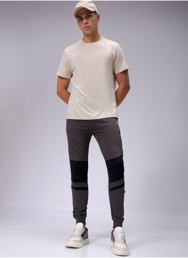 Men Slim Fit Solid Mid-Rise Stretchable Knitted Jogger Trousers