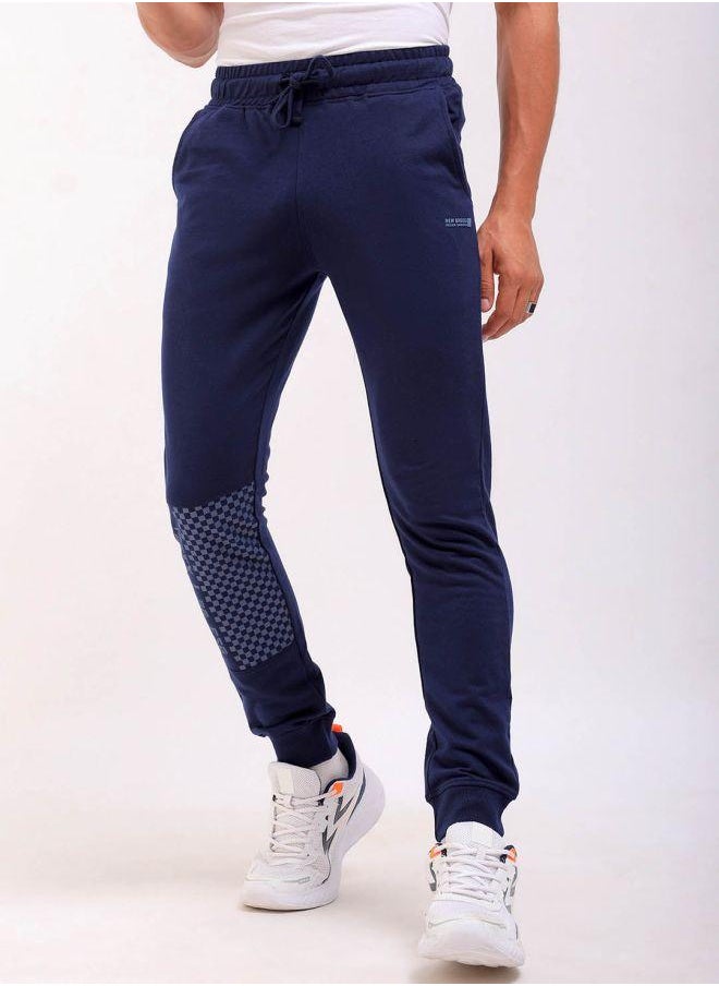 Men Slim Fit Solid Mid-Rise Stretchable Knitted Jogger Trousers