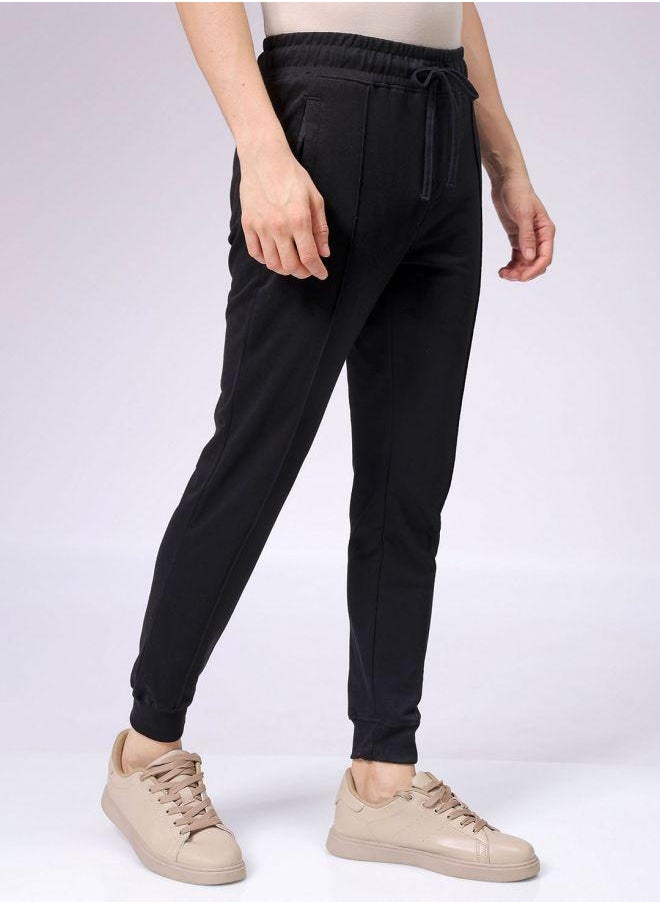Men Slim Fit Solid Mid-Rise Stretchable Knitted Jogger Trousers