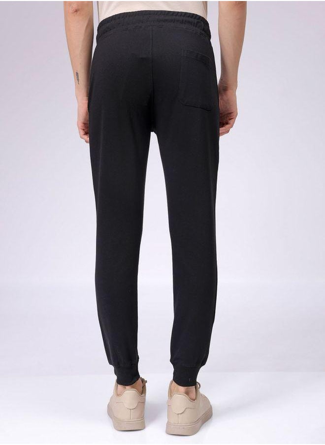 Men Slim Fit Solid Mid-Rise Stretchable Knitted Jogger Trousers