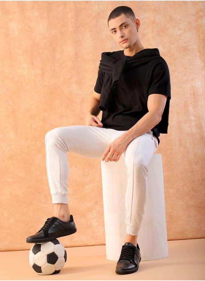 Men Slim Fit Solid Mid-Rise Stretchable Knitted Jogger Trousers